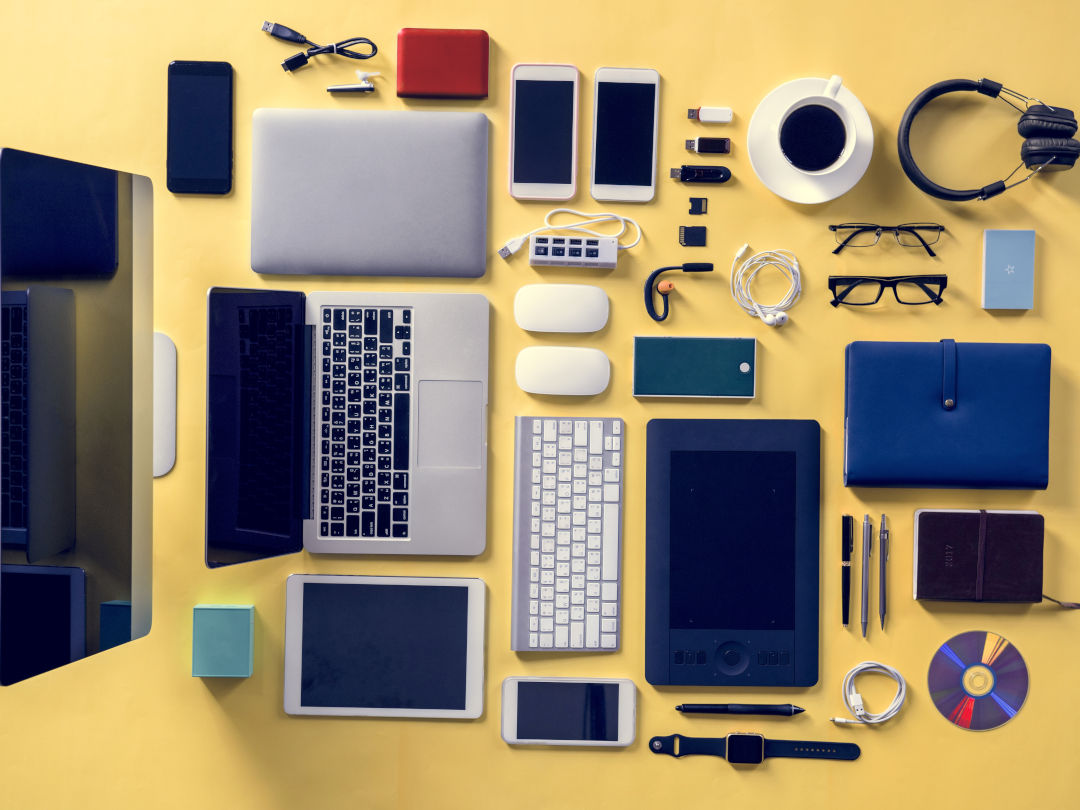electronic-devices-arranged-on-a-yellow-background-2026-03-18-14-34-57-utc